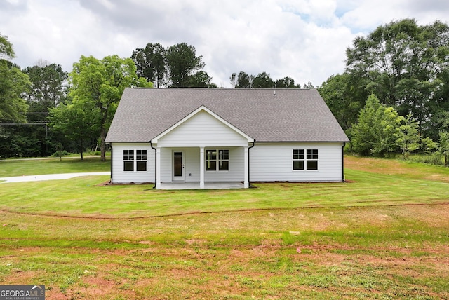 797 Ode Peppers Rd, Winder, GA 30680 - view of front of house with a front lawn, a patio area, and a shingled roof