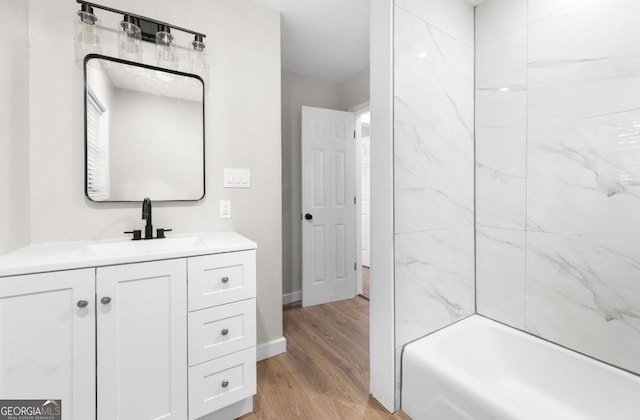6402 Kensington Ct, Austell, GA 30106 - bathroom with vanity, wood finished floors, and shower / bath combination