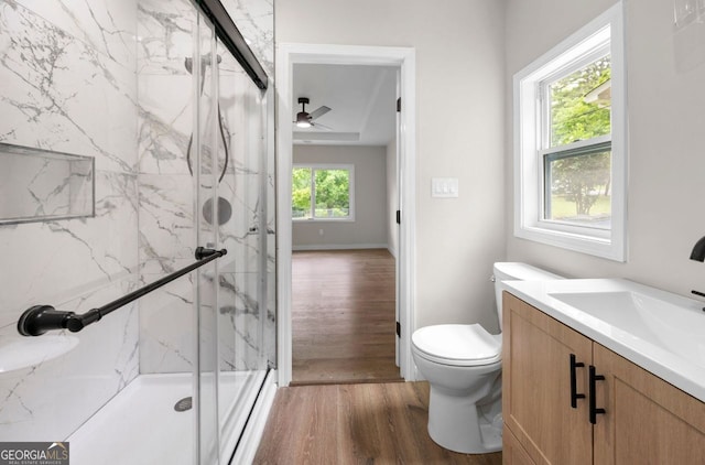 6402 Kensington Ct, Austell, GA 30106 - full bath featuring wood finished floors, a marble finish shower, vanity, and ceiling fan
