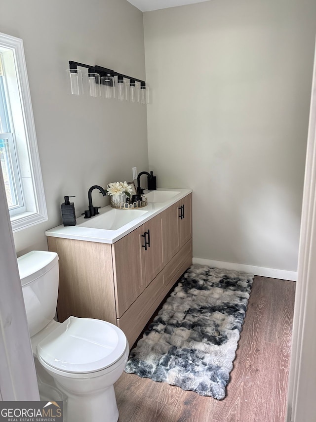 6402 Kensington Ct, Austell, GA 30106 - bathroom featuring wood finished floors and vanity