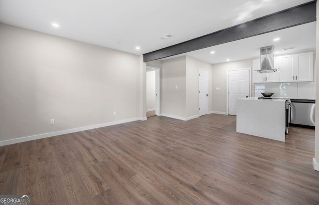 6402 Kensington Ct, Austell, GA 30106 - unfurnished living room featuring dark wood-type flooring and recessed lighting