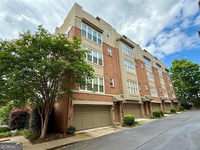 1376 Parkview Ln, Atlanta, GA 30324 - view of building exterior with a garage