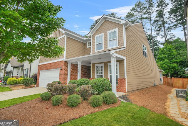 728 Lorimore Pass, Canton, GA 30115 - view of front of home featuring a garage, concrete driveway, and brick siding