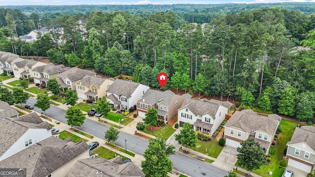 728 Lorimore Pass, Canton, GA 30115 - aerial perspective of suburban area featuring a heavily wooded area