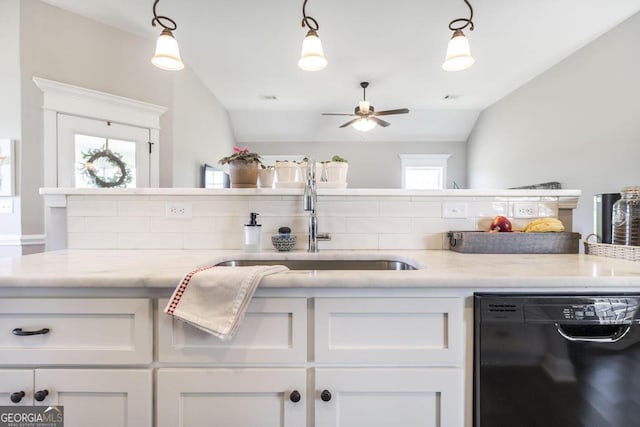 2303 Quail Ridge Ln, Perry, GA 31069 - kitchen with black dishwasher, a ceiling fan, white cabinets, light stone counters, and lofted ceiling