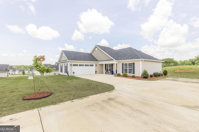 2303 Quail Ridge Ln, Perry, GA 31069 - view of front of house with a garage, driveway, and a front lawn