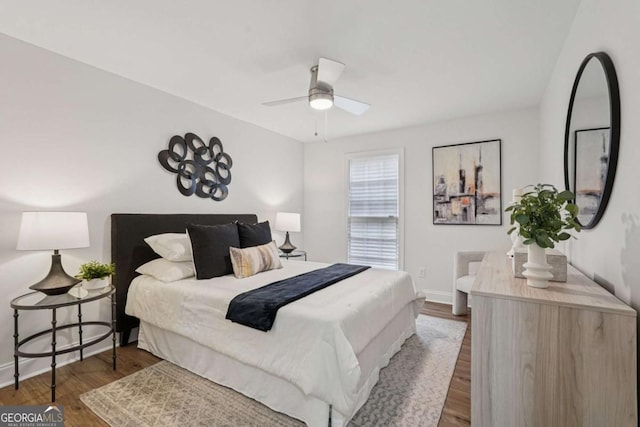 1166 Booth Rd SW Unit 301, Marietta, GA 30008 - bedroom with wood finished floors and a ceiling fan