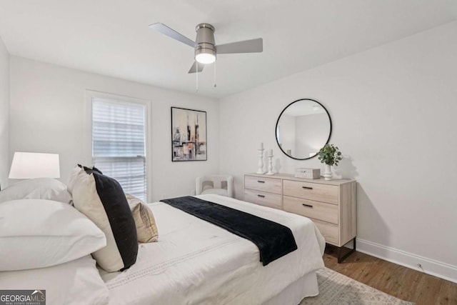 1166 Booth Rd SW Unit 301, Marietta, GA 30008 - bedroom with wood finished floors and ceiling fan
