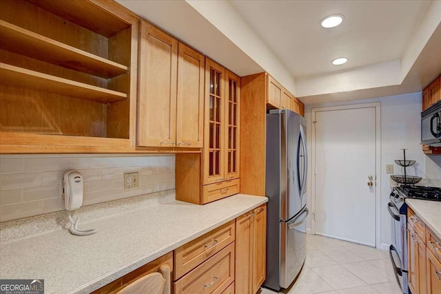 6851 Roswell Rd Unit G20, Sandy Springs, GA 30328 - kitchen with appliances with stainless steel finishes, open shelves, light countertops, light tile patterned flooring, and recessed lighting