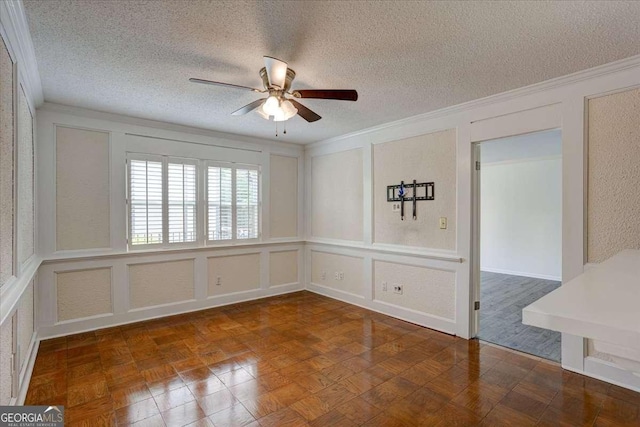 6851 Roswell Rd Unit G20, Sandy Springs, GA 30328 - empty room featuring a decorative wall, crown molding, a ceiling fan, and a textured ceiling