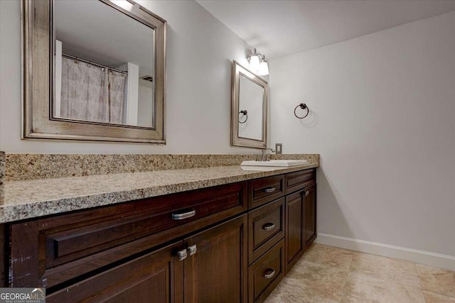 6851 Roswell Rd Unit G20, Sandy Springs, GA 30328 - full bathroom with double vanity and tile patterned flooring