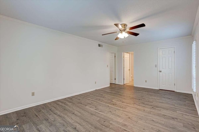 6851 Roswell Rd Unit G20, Sandy Springs, GA 30328 - unfurnished room with ceiling fan, wood finished floors, and crown molding