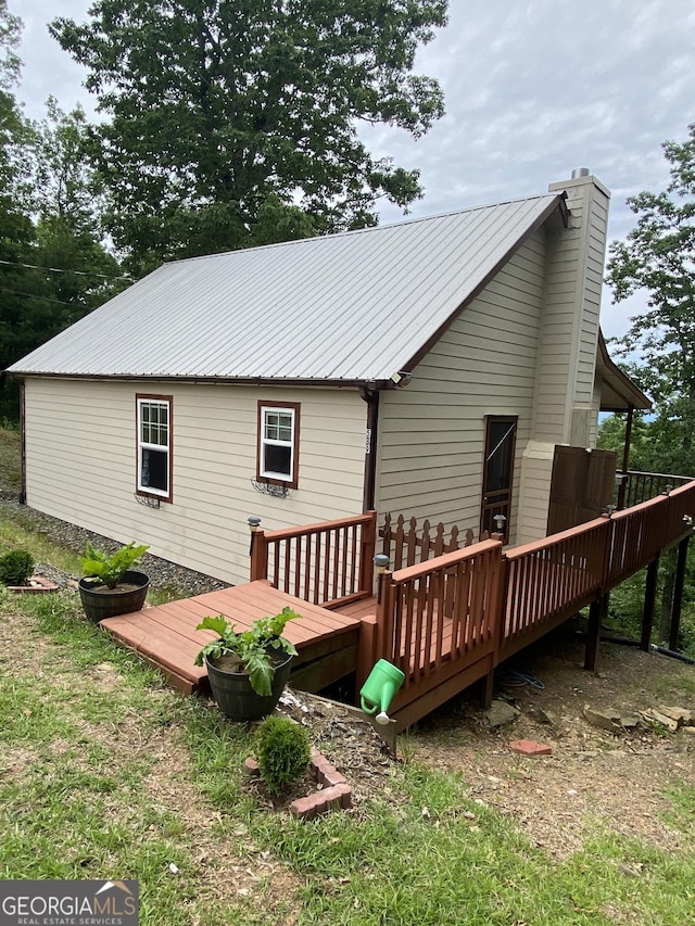 539 Dowel Cir, Ellijay, GA 30540 - back of house with a deck, a chimney, and a metal roof
