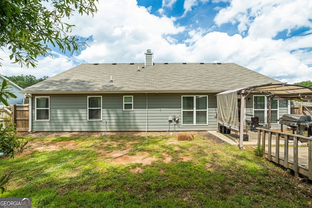 126 Sawgrass Ln, Statham, GA 30666 - rear view of house with a chimney and a shingled roof