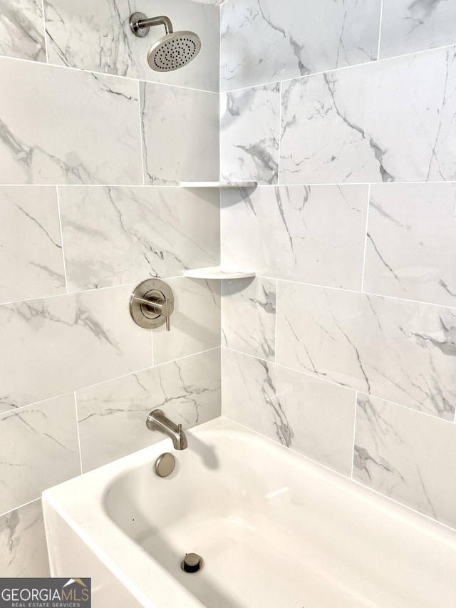 708 Degroat St, Lagrange, GA 30241 - bathroom featuring washtub / shower combination