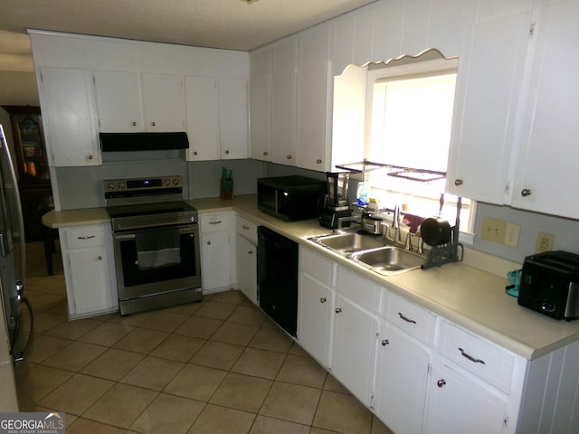 871 Chisholm Trl, Macon, GA 31220 - kitchen featuring black appliances, under cabinet range hood, white cabinetry, light countertops, and light tile patterned floors