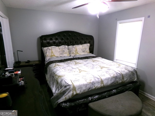 871 Chisholm Trl, Macon, GA 31220 - bedroom featuring a ceiling fan and wood finished floors