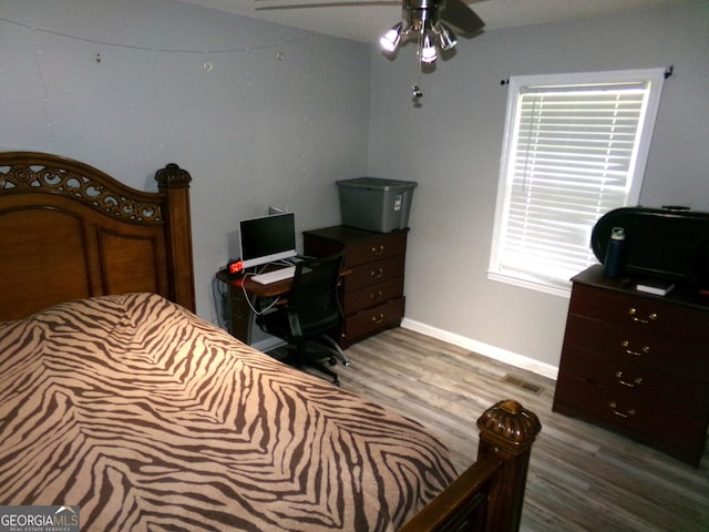 871 Chisholm Trl, Macon, GA 31220 - bedroom featuring wood finished floors and ceiling fan