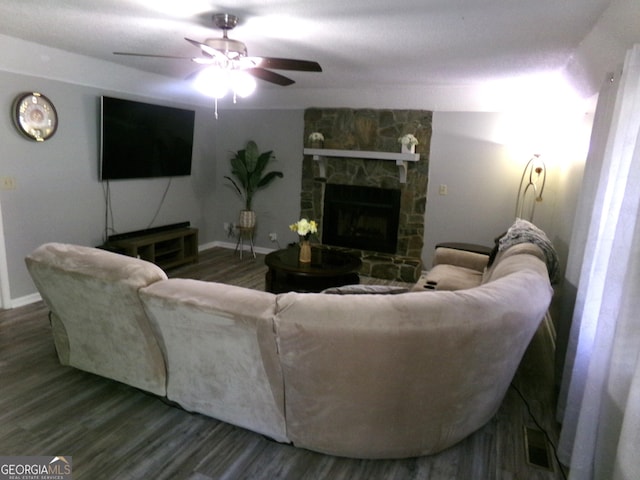 871 Chisholm Trl, Macon, GA 31220 - living room with wood finished floors, ceiling fan, and a fireplace