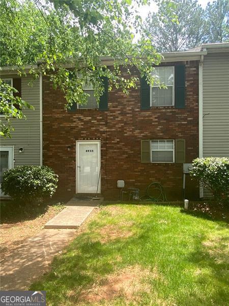 8955 Stonebridge Blvd, Douglasville, GA 30134 - view of front of home with a front lawn and brick siding