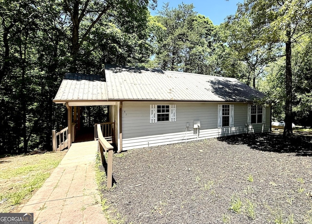 83 Austin Ct, Dahlonega, GA 30533 - view of front of house with a metal roof and a porch