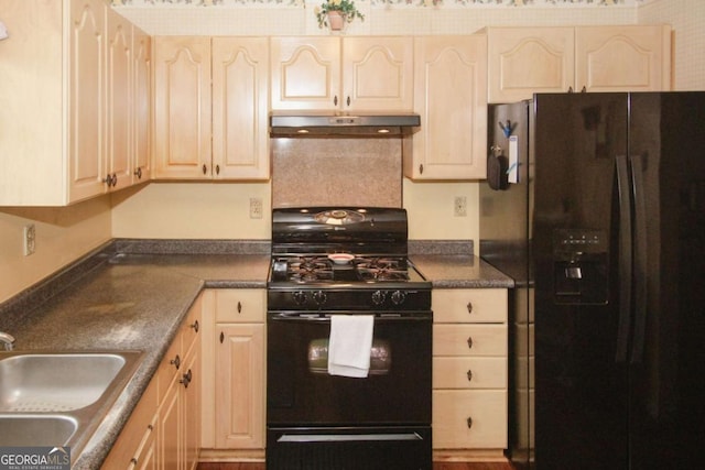125 Pebble Beach Ct, Atlanta, GA 30349 - kitchen featuring black appliances, dark countertops, under cabinet range hood, and light brown cabinetry