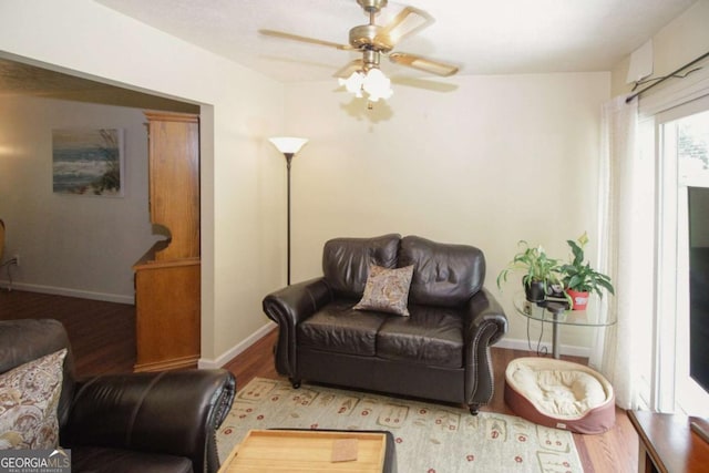 125 Pebble Beach Ct, Atlanta, GA 30349 - living area featuring wood finished floors and a ceiling fan