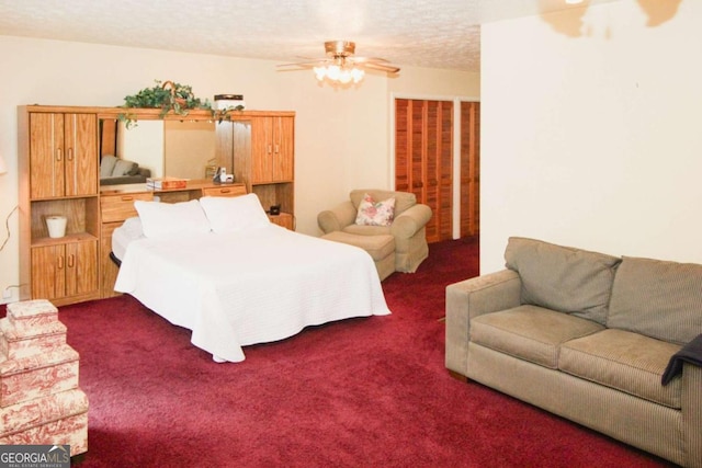 125 Pebble Beach Ct, Atlanta, GA 30349 - bedroom featuring carpet flooring, ceiling fan, and a textured ceiling