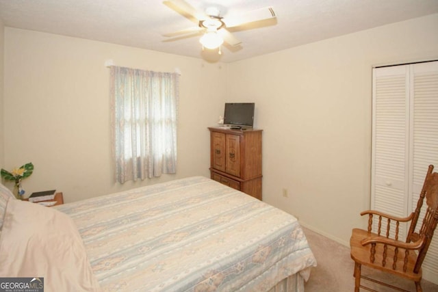125 Pebble Beach Ct, Atlanta, GA 30349 - bedroom featuring carpet, a closet, and ceiling fan