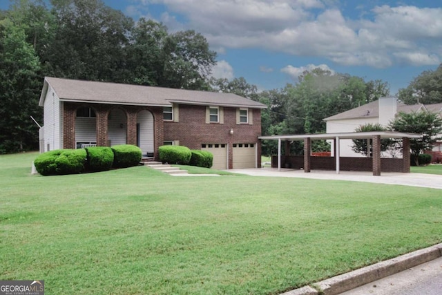 125 Pebble Beach Ct, Atlanta, GA 30349 - bi-level home featuring brick siding, driveway, an attached garage, and a front yard