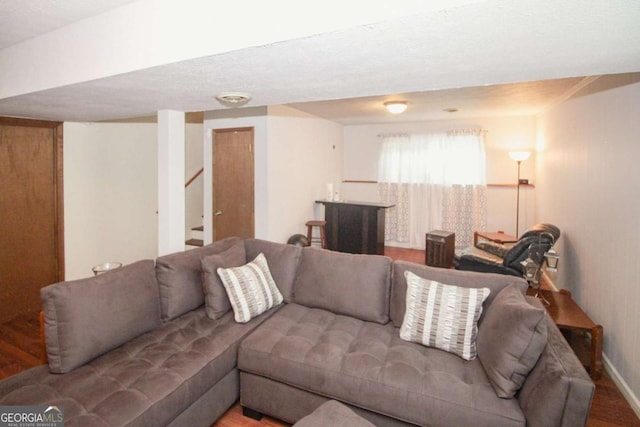 125 Pebble Beach Ct, Atlanta, GA 30349 - living room featuring wood finished floors and stairs
