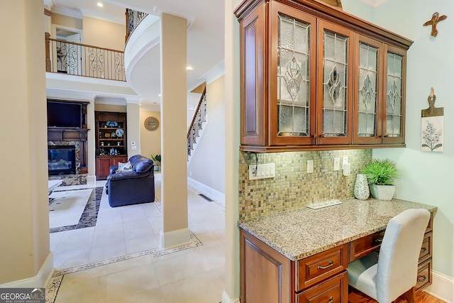 805 Cog Hl, Mcdonough, GA 30253 - bar featuring backsplash, a premium fireplace, stairway, and light tile patterned floors