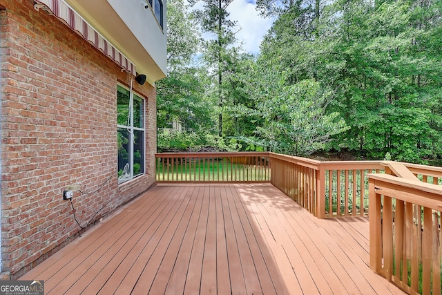 805 Cog Hl, Mcdonough, GA 30253 - wooden terrace with view of wooded area
