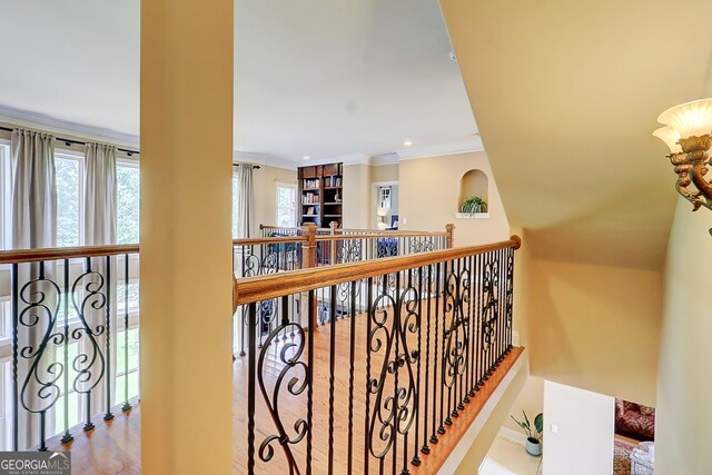 805 Cog Hl, Mcdonough, GA 30253 - hallway featuring crown molding, an upstairs landing, and wood finished floors