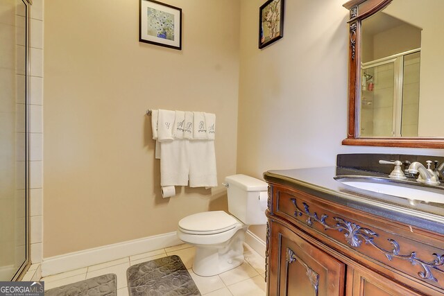 805 Cog Hl, Mcdonough, GA 30253 - bathroom featuring tile patterned flooring, vanity, and a tile shower