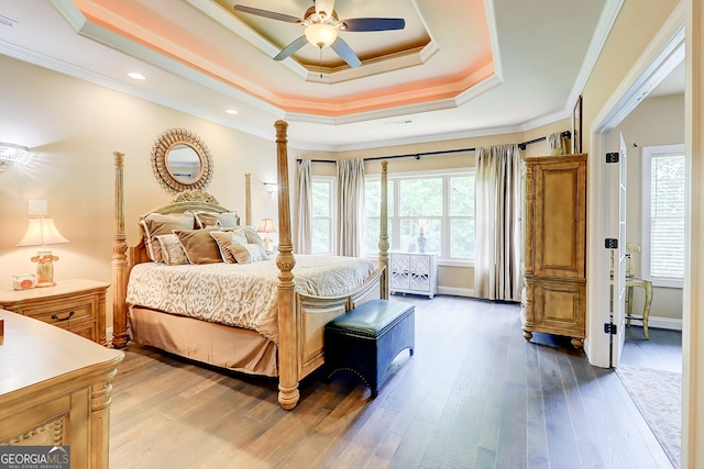 805 Cog Hl, Mcdonough, GA 30253 - bedroom featuring a tray ceiling, wood finished floors, ornamental molding, and recessed lighting