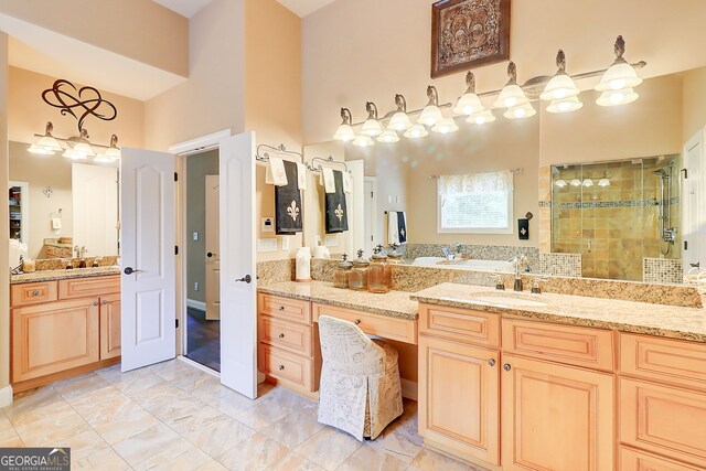 805 Cog Hl, Mcdonough, GA 30253 - full bathroom with a stall shower, a high ceiling, vanity, and marble finish flooring