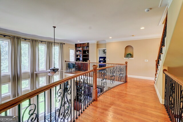 805 Cog Hl, Mcdonough, GA 30253 - hallway with light wood-style floors, ornamental molding, an upstairs landing, and recessed lighting