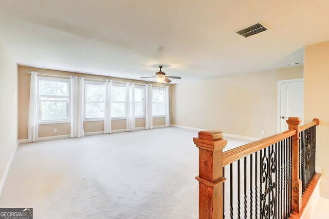 805 Cog Hl, Mcdonough, GA 30253 - carpeted spare room featuring ceiling fan and healthy amount of natural light