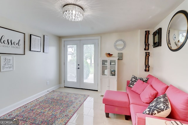 805 Cog Hl, Mcdonough, GA 30253 - foyer featuring french doors, a chandelier, and light tile patterned floors