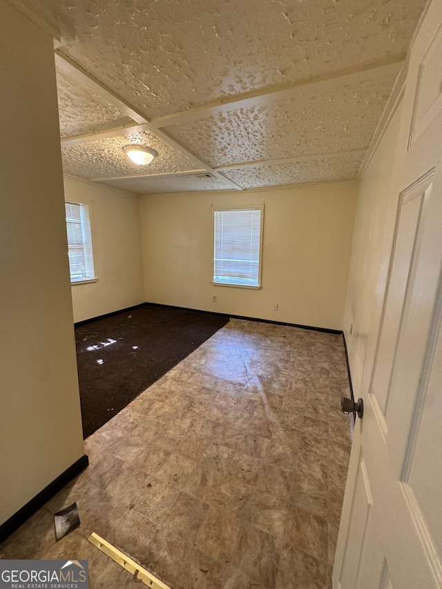 1004 Mapp St, Madison, GA 30650 - spare room featuring baseboards