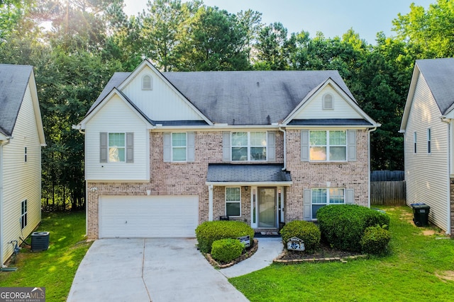 4613 Beau Point Ct, Snellville, GA 30039 - view of front of home with brick siding, a garage, and driveway