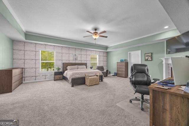 89 Crestview Dr, Guyton, GA 31312 - bedroom with a textured ceiling, an office area, carpet flooring, a tray ceiling, and crown molding