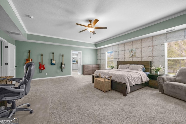 89 Crestview Dr, Guyton, GA 31312 - carpeted bedroom featuring ornamental molding, a raised ceiling, ceiling fan, and ensuite bathroom