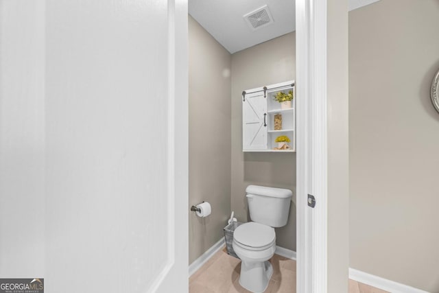 89 Crestview Dr, Guyton, GA 31312 - bathroom featuring toilet and tile patterned floors
