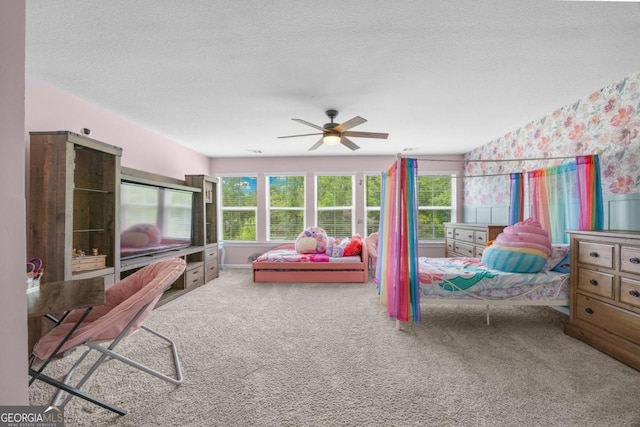 89 Crestview Dr, Guyton, GA 31312 - bedroom featuring carpet floors, a ceiling fan, and a textured ceiling