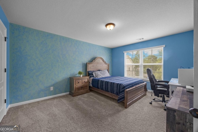 89 Crestview Dr, Guyton, GA 31312 - carpeted bedroom featuring a textured ceiling and a desk