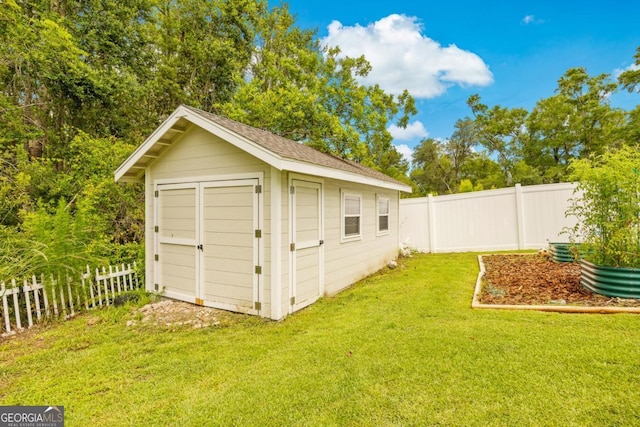 89 Crestview Dr, Guyton, GA 31312 - view of shed featuring a fenced backyard