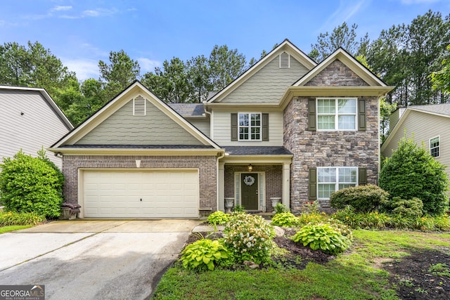 58 Lilyfield Ln, Acworth, GA 30101 - view of front of house with concrete driveway, a garage, and stone siding