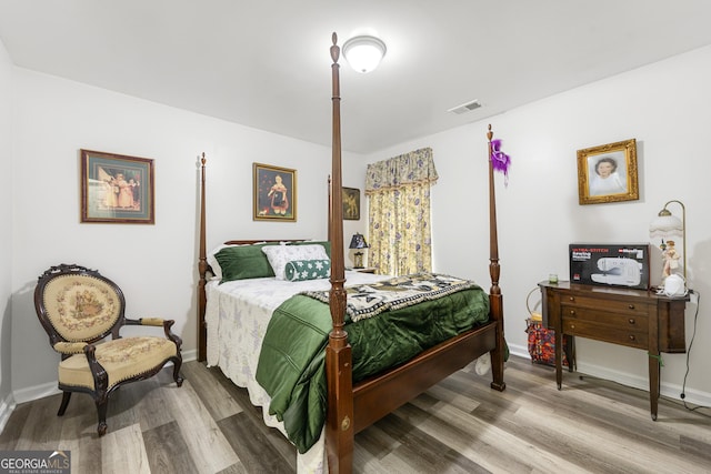 58 Lilyfield Ln, Acworth, GA 30101 - bedroom featuring wood finished floors and baseboards